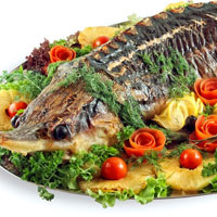 Осетрина, запеченная цельным куском Осетрина, запеченная цельным куском